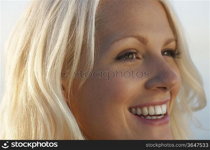 Young woman smiling, close up