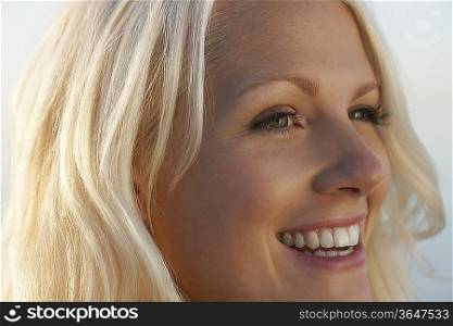 Young woman smiling, close up