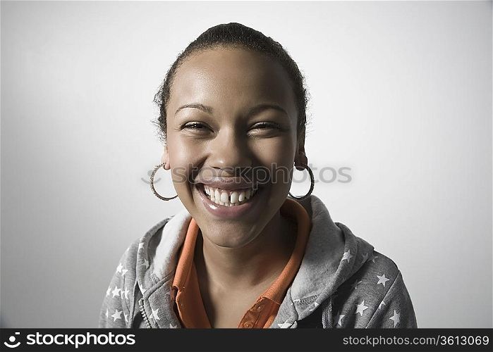 Young woman smiling, close-up view