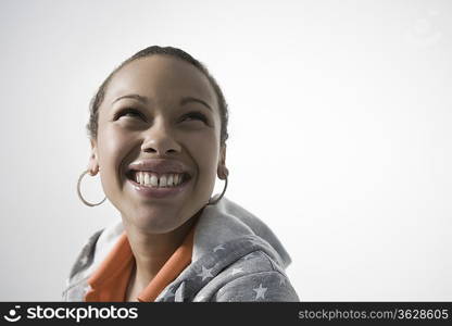 Young woman smiling, close-up view