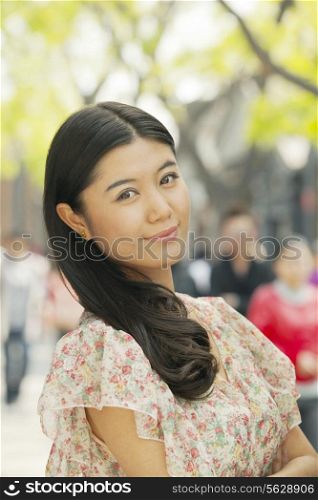 Young Woman smiling looking at camera