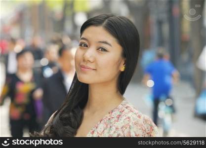 Young Woman smiling looking at camera