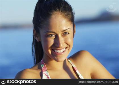 Young woman smiling outdoors portrait