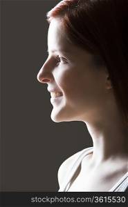 Young woman smiling side view portrait