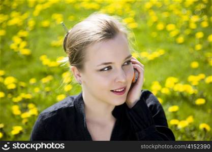 Young Woman Speaking By Cell Phone