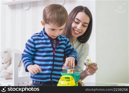 young woman spending time with son
