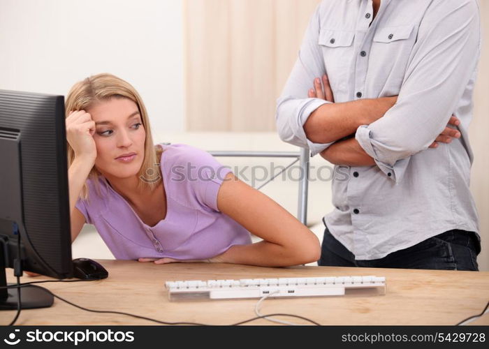 Young woman sprawling on her desk