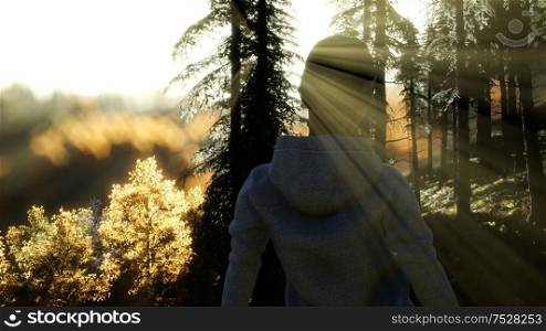 Young Woman standing alone outdoor with wild forest mountains