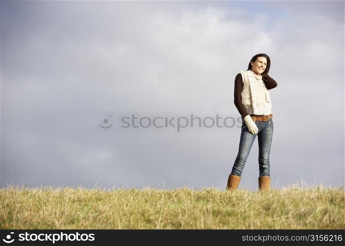 Young Woman Standing In Park