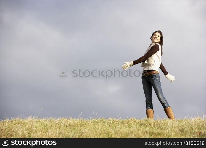 Young Woman Standing In Park