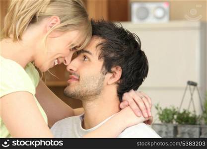 Young woman staring at her boyfriend tenderly