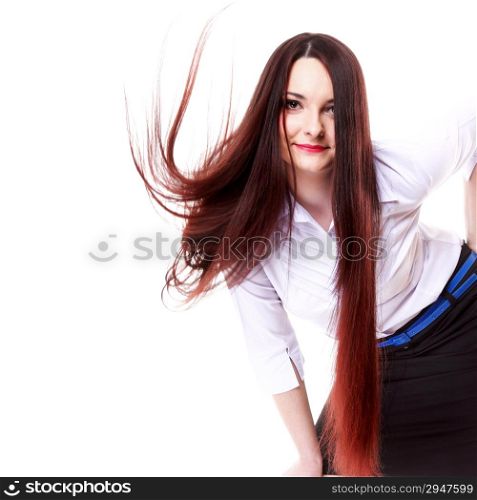 Young woman straight long dark hair blowing in the wind studio shot isolated on white background