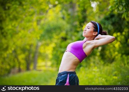 Young woman stretching