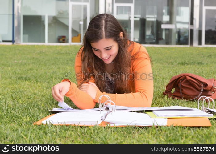 Young woman studying at the university campus