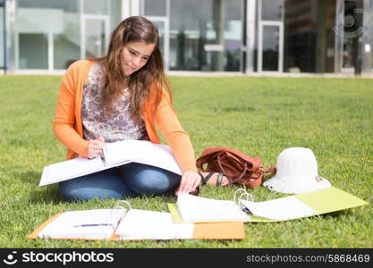 Young woman studying at the university campus