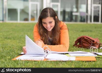 Young woman studying at the university campus