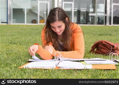 Young woman studying at the university campus