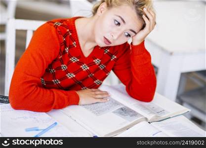 young woman studying exam