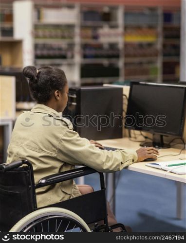 young woman studying library