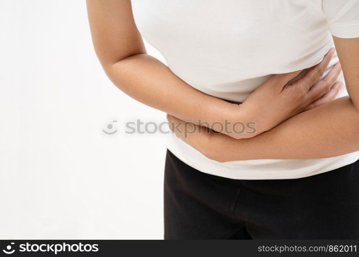 Young woman suffering from abdominal pain feeling stomachache, symptom of pms on white background