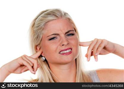 young woman suffering from noise pollution, covers his ears.