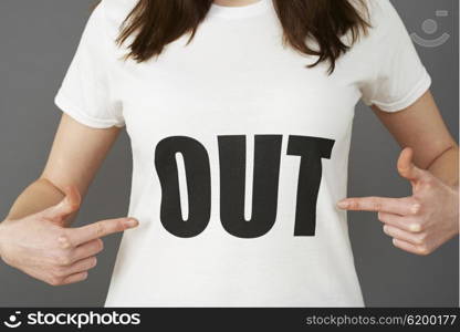 Young Woman Supporter Wearing T Shirt Printed With OUT Slogan