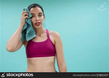 young woman sweating after training