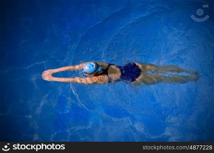 Young woman swimmer in pool