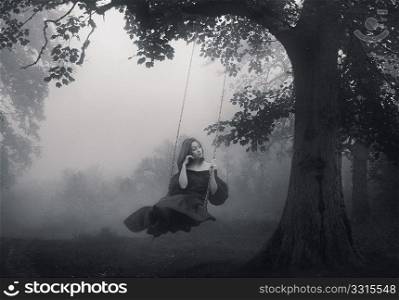 young woman swinging outdoor