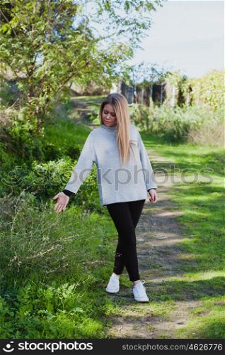Young woman taking a walk in a relaxed day
