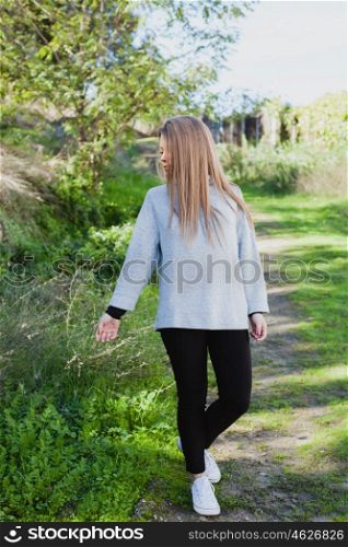 Young woman taking a walk in a relaxed day