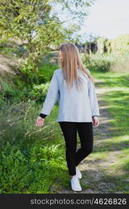 Young woman taking a walk in a relaxed day