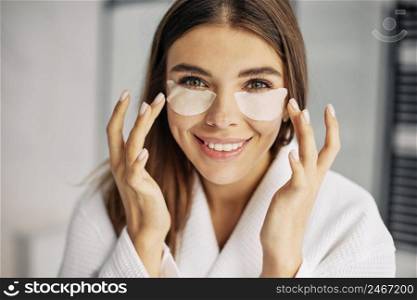 young woman taking care her face