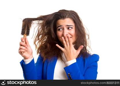 Young woman taking care of her hair isolated over white
