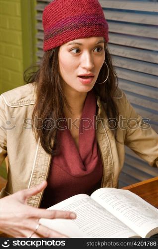 Young Woman Talking and Reading