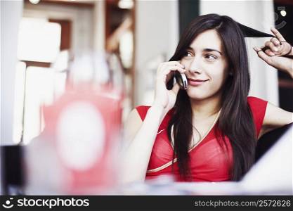 Young woman talking on a mobile phone