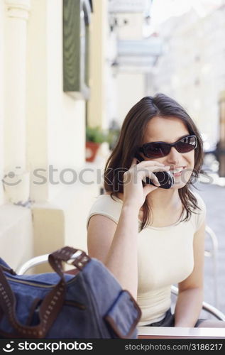 Young woman talking on a mobile phone