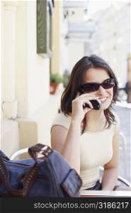Young woman talking on a mobile phone