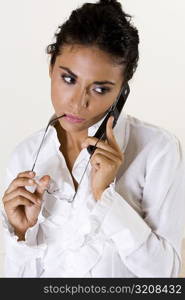 Young woman talking on a mobile phone