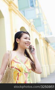 Young woman talking on a mobile phone