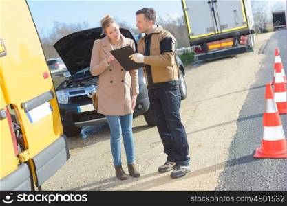young woman talking to assistance car service