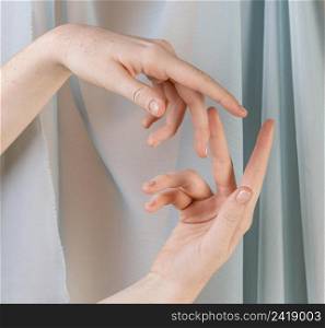young woman teaching sign language 2