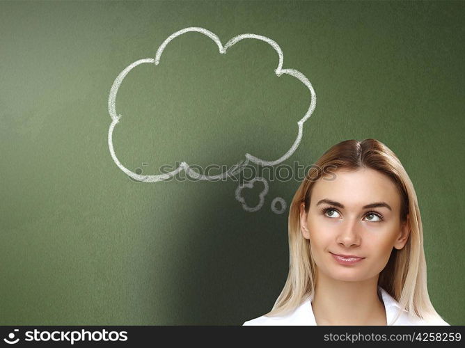 Young woman thinking and dreaming about her future