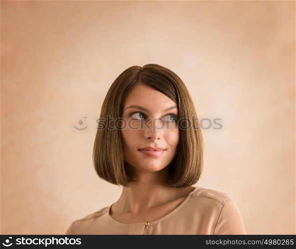 Young woman thinking of her plans closeup face portrait and lots of copyspace