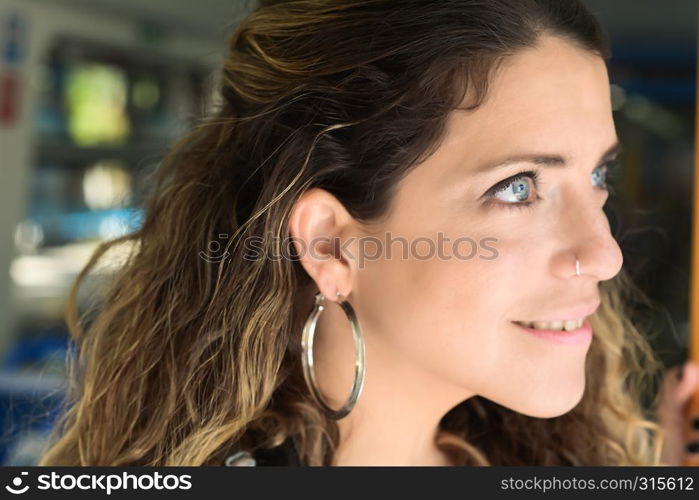 Young woman tourist traveling by the train. Enjoying travel concept.