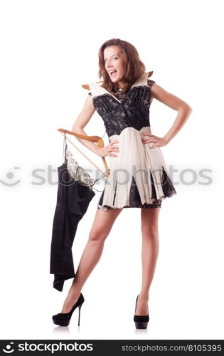 Young woman trying new clothing on white