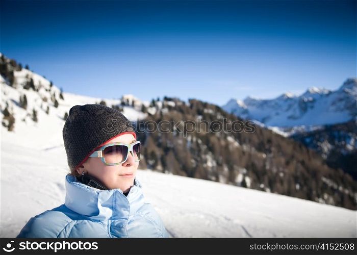 Young Woman Under The Sunlight In Italian Mountains