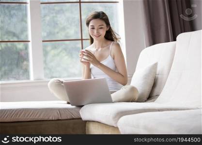 Young woman using a laptop computer
