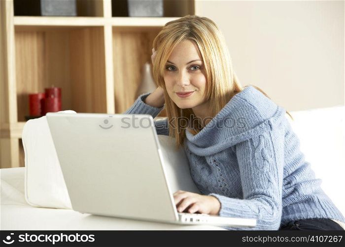 Young Woman Using Laptop Computer