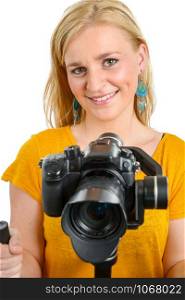 young woman videographer using steady cam, on white